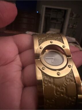 Gucci Gold-Tone Embossed Leather Bangle Watch
